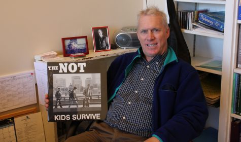 Mr. Lamont shows off his band's record.
