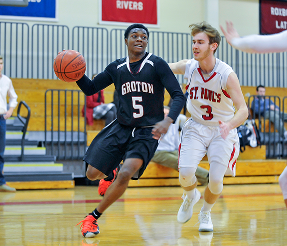 Noah Aaron ‘18 competes against St. Paul’s in basketball.